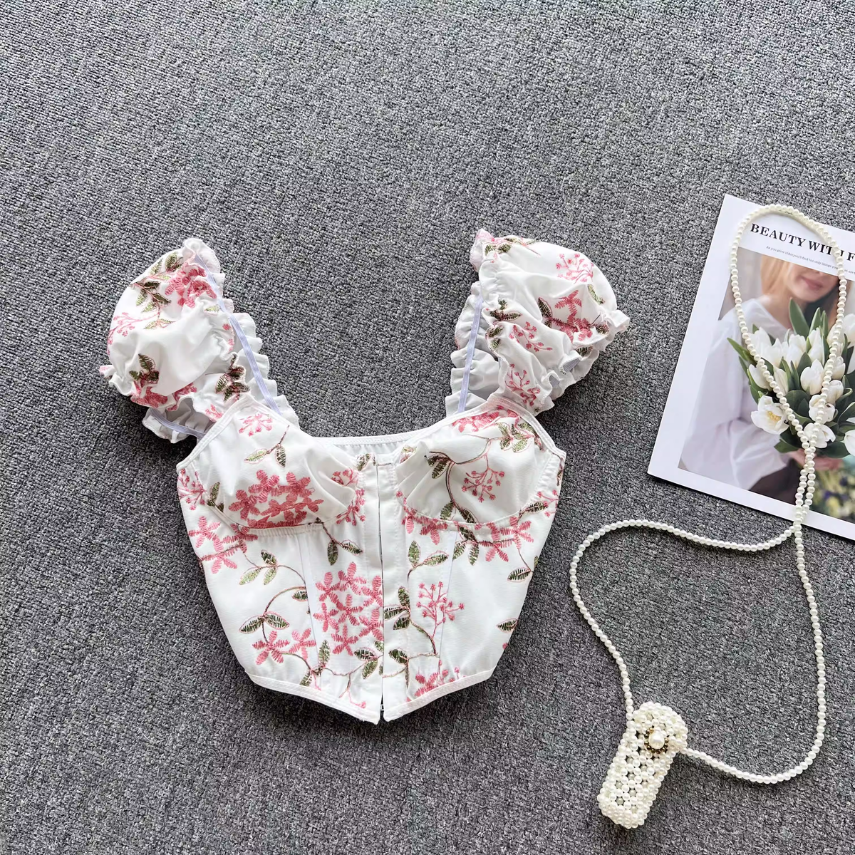 Summer holiday style lace-up back floral top