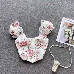 Summer holiday style lace-up back floral top