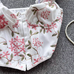 Summer holiday style lace-up back floral top