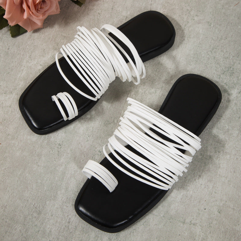 Hollow tassel square toe flat slippers