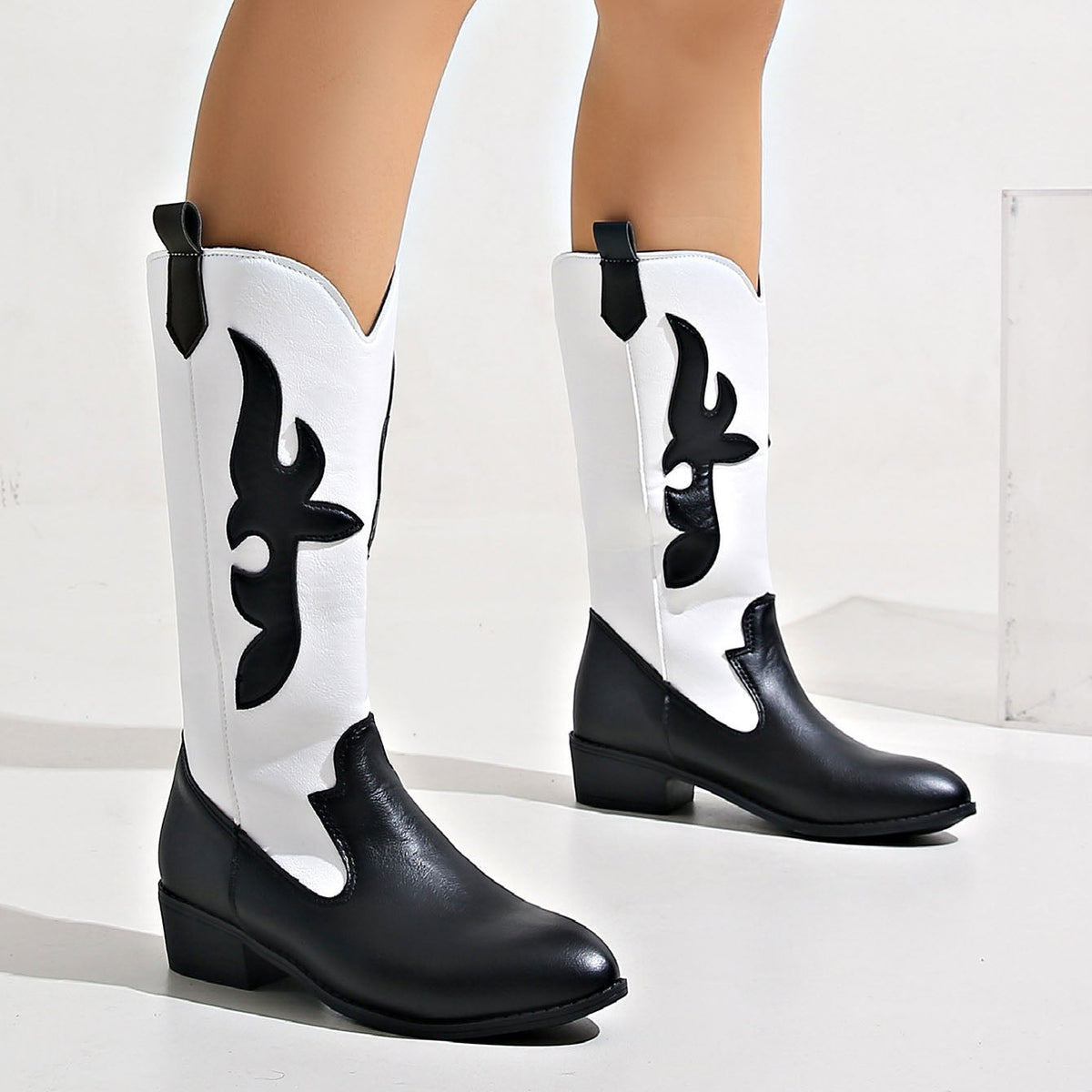 Black and white spliced pointed toe knight boots